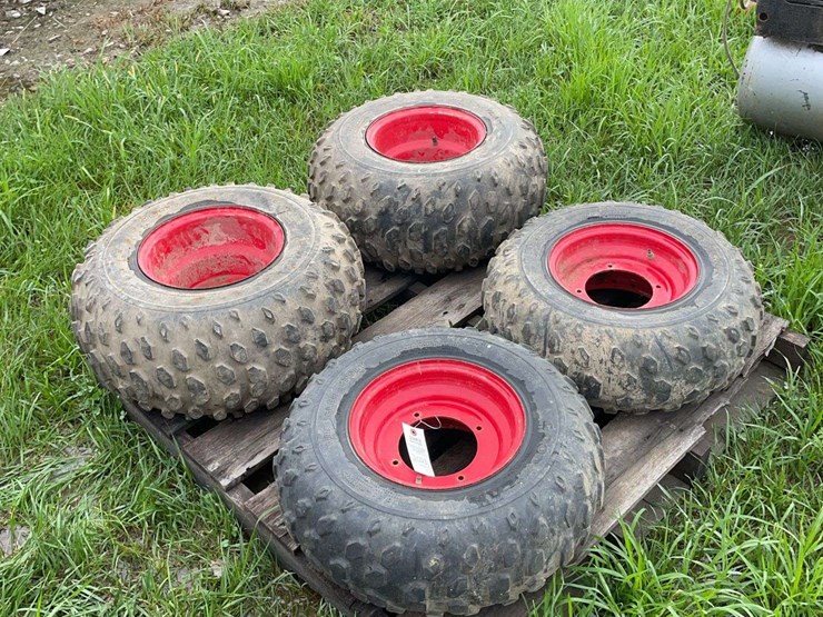 pair-of-24x11.00x10nhs-tires-on-4-bolt-rims-&-pair-of-22x8.00x10nhs-tires-on-4-bolt-rims-image-1