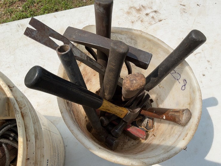 (2)-buckets-of-misc.-tools-to-include-hammers,-level,-and-electric-clippers.-#228-image-3