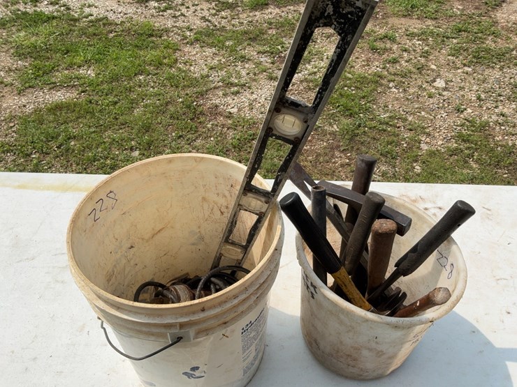 (2)-buckets-of-misc.-tools-to-include-hammers,-level,-and-electric-clippers.-#228-image-1