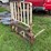 pallet-forks-for-skid-steer,-has-bent-frame-image-3