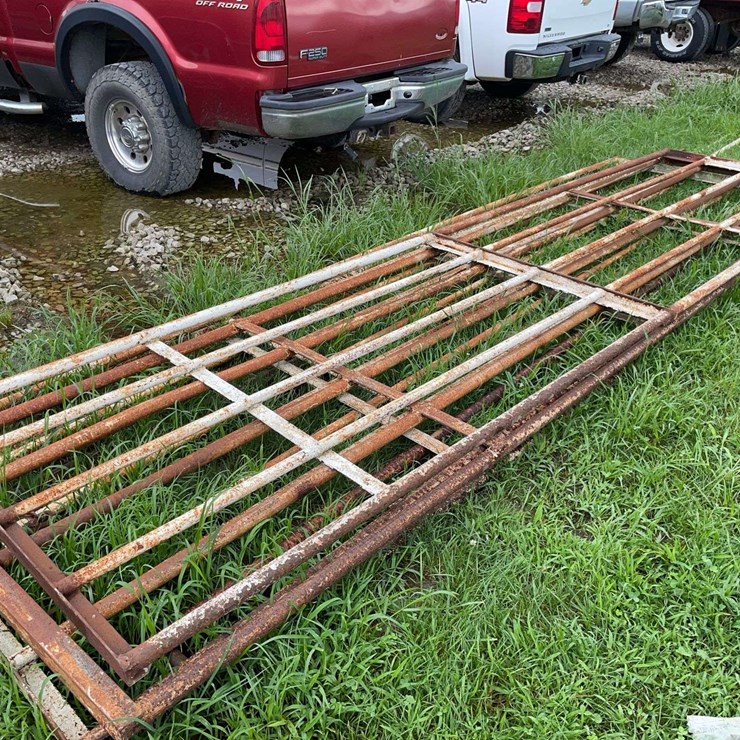 4- 16ft steel battle gates with hinges, 1- 15-1/2ft steel cattle gate