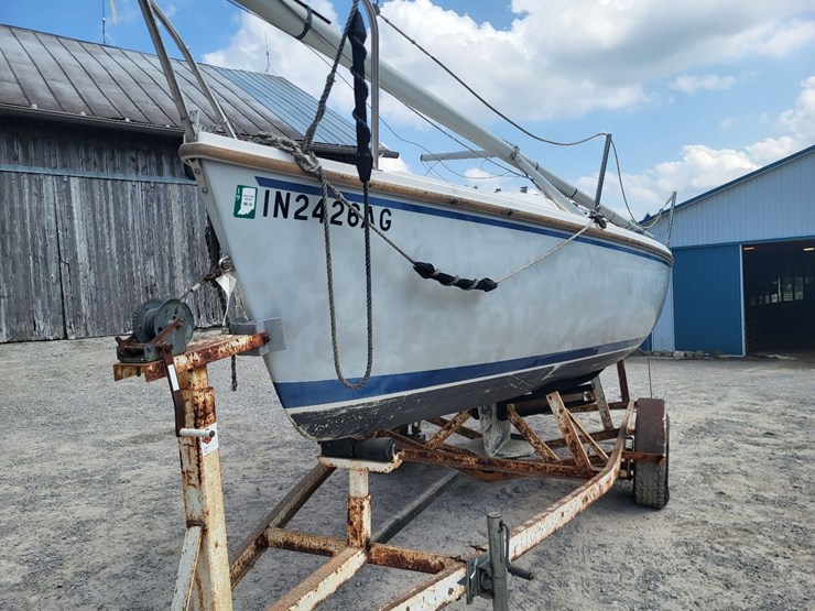 capri-sailboat-w/-single-axle-bumper-trailer-and-johnson-sailmaster-motor-image-9