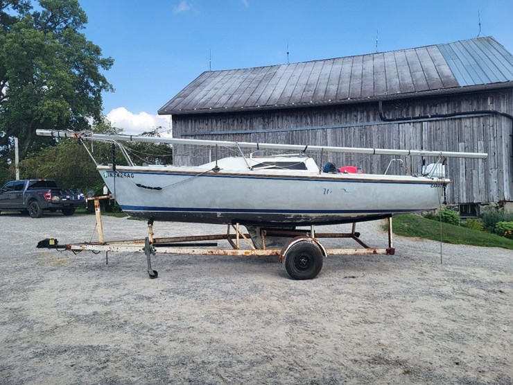 capri-sailboat-w/-single-axle-bumper-trailer-and-johnson-sailmaster-motor-image-2