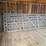 (4)-livestock-gates,-(2)-livestock-panels,-and-(1)-roll-of-woven-wire-fence-image-1
