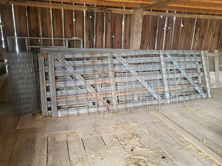 (4)-livestock-gates,-(2)-livestock-panels,-and-(1)-roll-of-woven-wire-fence-image-1