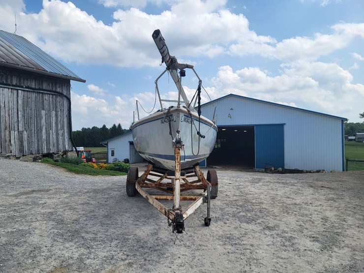 capri-sailboat-w/-single-axle-bumper-trailer-and-johnson-sailmaster-motor-image-8