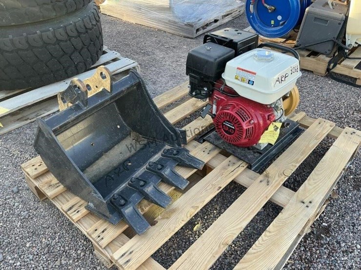 gas-powered-water-pump-&-bobcat-bucket-image-1