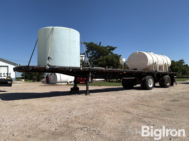1995-daco-f25tar4595-t/a-spread-flatbed-trailer-w/tanks-image-1