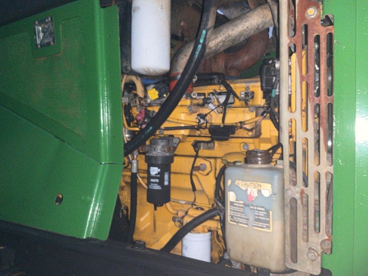 2006-deere-648g-iii-image-12