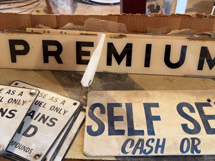 gas-pumps-signage-and-plastic-plates-image-3