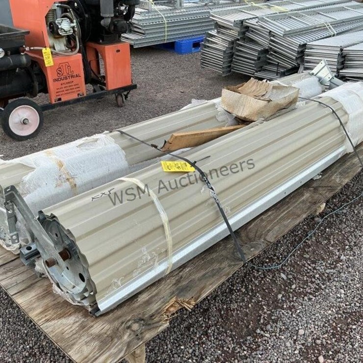 (2) 86 1/2IN WIDE METAL ROLL-UP DOORS