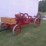 #6030-•-1923-economy-5-hp-gas-engine-on-steel-wheel-trucks-w/-buzz-saw-rig-image-1