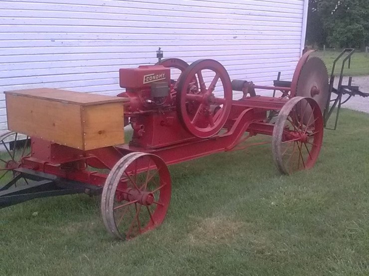 #6030-•-1923-economy-5-hp-gas-engine-on-steel-wheel-trucks-w/-buzz-saw-rig-image-1