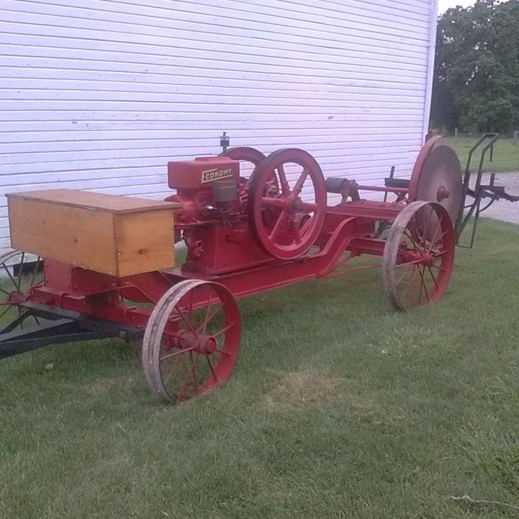 #6030 • 1923 Economy 5 HP Gas Engine on Steel-Wheel Trucks w/ Buzz Saw Rig