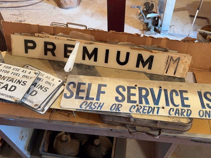 gas-pumps-signage-and-plastic-plates-image-1