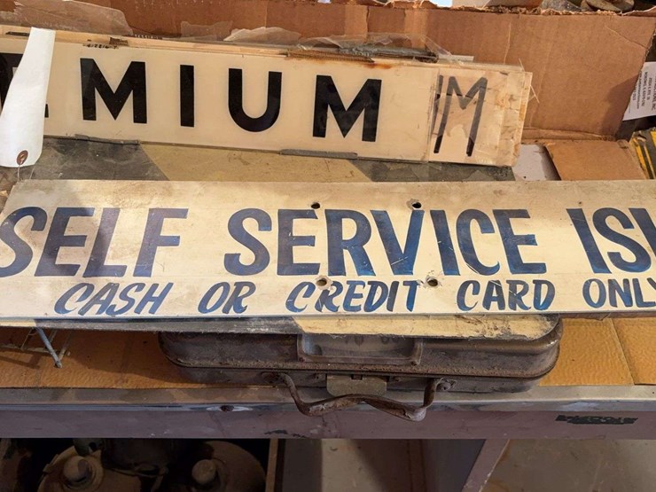gas-pumps-signage-and-plastic-plates-image-4