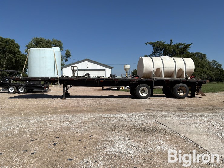 1995-daco-f25tar4595-t/a-spread-flatbed-trailer-w/tanks-image-8