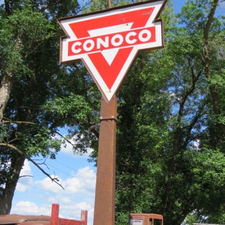 Conoco Porcelain sign on pole with Frame