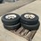 #5557-•-(4)-goodyear-workhorse-7.00-15lt-tires-on-white-steel-rims-image-2