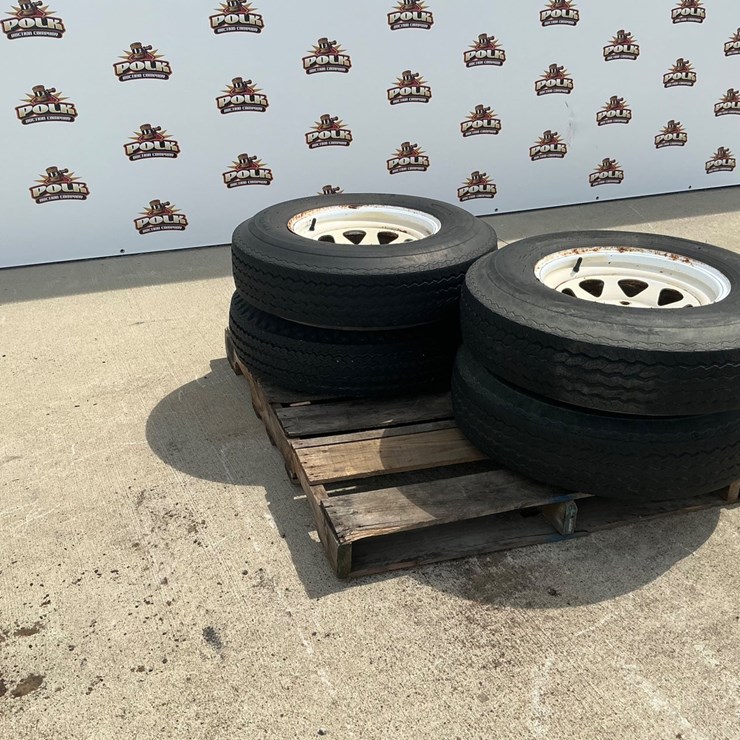 #5557 • (4) Goodyear Workhorse 7.00-15LT Tires on White Steel Rims