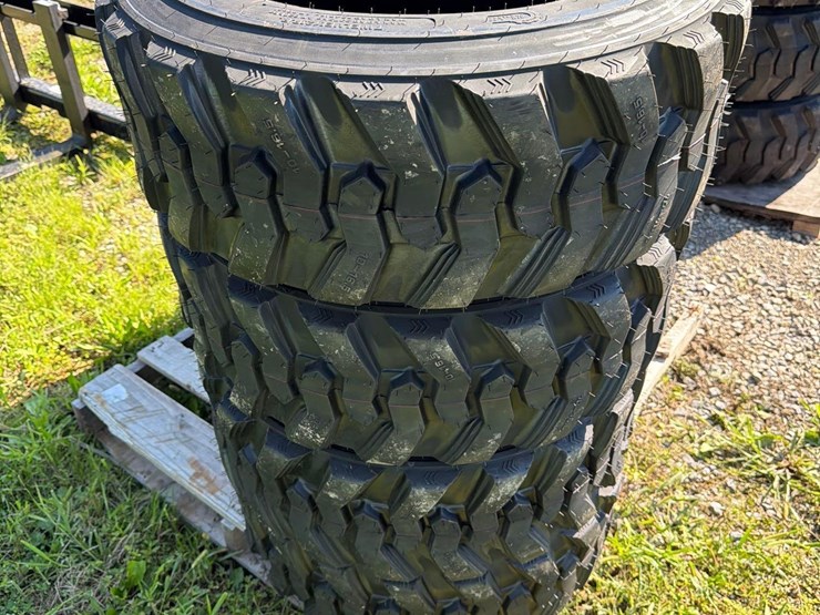 set-of-4-new-10-16.5-skid-steer-tires-image-1