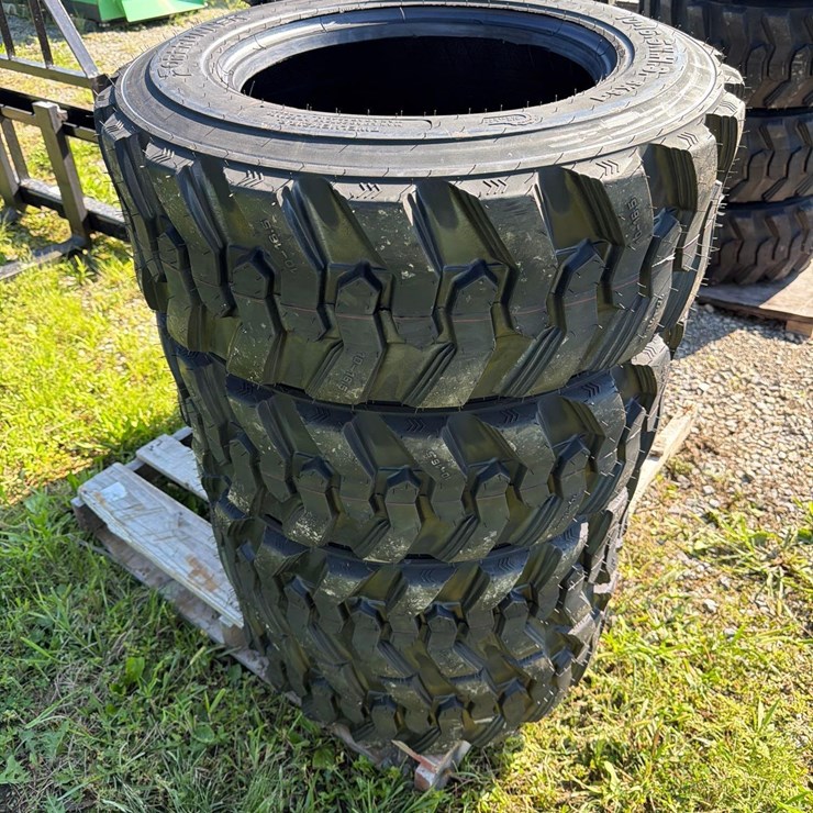 Set of 4 NEW 10-16.5 Skid Steer Tires