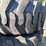 set-of-4-new-12-16.5-skid-steer-tires-on-rims-image-3