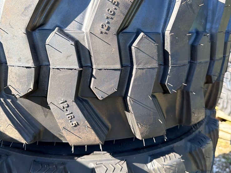 set-of-4-new-12-16.5-skid-steer-tires-on-rims-image-3
