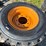 set-of-4-new-12-16.5-skid-steer-tires-on-rims-image-2