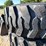 set-of-4-new-12-16.5-skid-steer-tires-on-rims-image-3