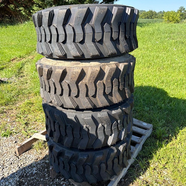 Set of 4 NEW 12-16.5 Skid Steer Tires