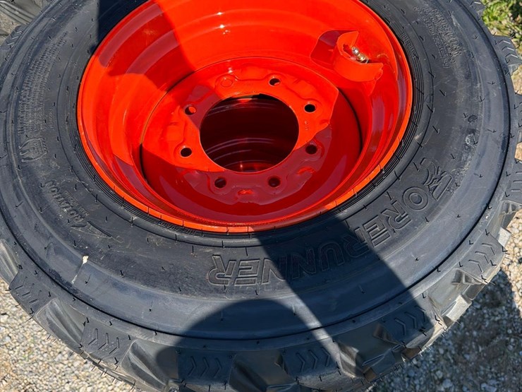 set-of-4-new-12-16.5-skid-steer-tires-on-rims-image-2