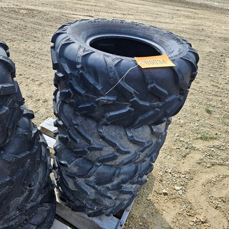 #34 • 4 - 25 x 11.00-12 NHS Tires