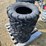 #35-•-4---25-x-11.00-12-nhs-tires-image-1
