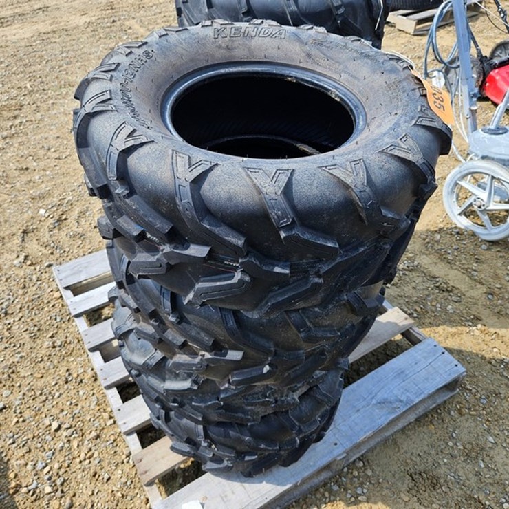 #35 • 4 - 25 x 11.00-12 NHS Tires