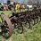 horse-drawn-13-shank-spring-tooth-harrow-cultivator-9’4”-working-width-steel-wheels.-image-1