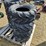 #37-•-4---25-x-11.00-12-nhs-tires-image-1