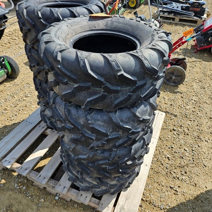 #37 • 4 - 25 x 11.00-12 NHS Tires