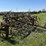 horse-drawn-13-shank-spring-tooth-harrow-cultivator-9’4”-working-width-steel-wheels.-image-5