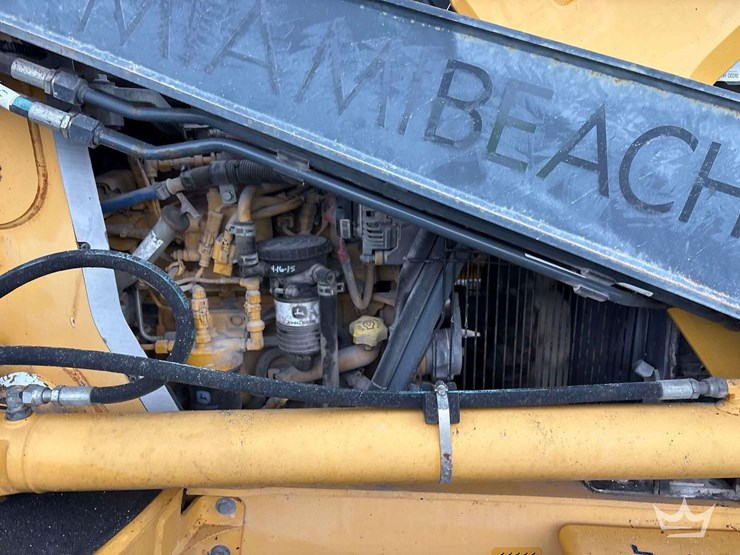2015-deere-410l-image-17