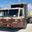 2012-crane-carrier-co.-low-entry-t/a-loadmaster-rear-loader-garbage-truck-image-1