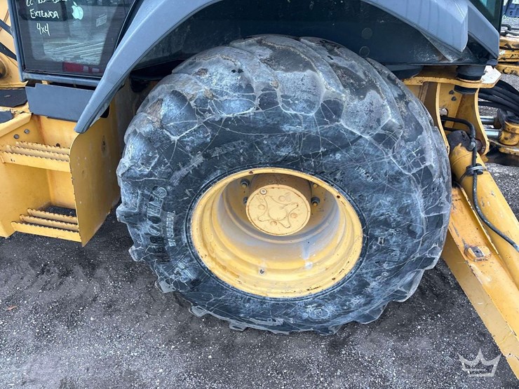 2015-deere-410l-image-28