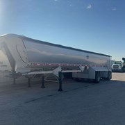 2012 Mac Dump Trailer, Half round, spread axle w/ front lift, new 10 foot 3/8” liner, new tarp w/ poly bows, decent tires and brakes, clean IL title, VIN- 5MADN4028CC021430.