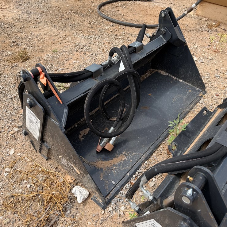 Unused 4-Way Mini Skid steer bucket