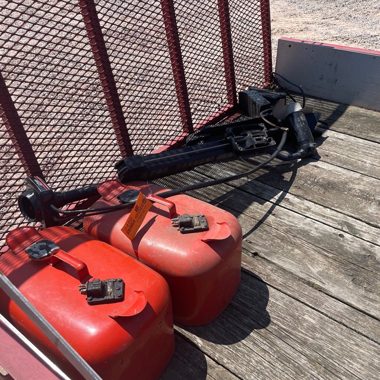 #2499 • Johnson Trolling Motor and (2) Boat Fuel Cans
