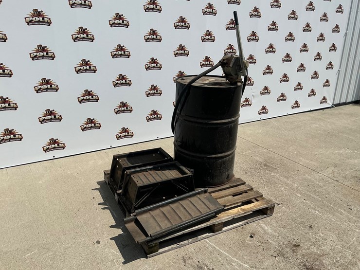 #5055-•-55-gallon-drum-with-great-plains-industries-hp100-pump-and-set-of-ramps-image-1