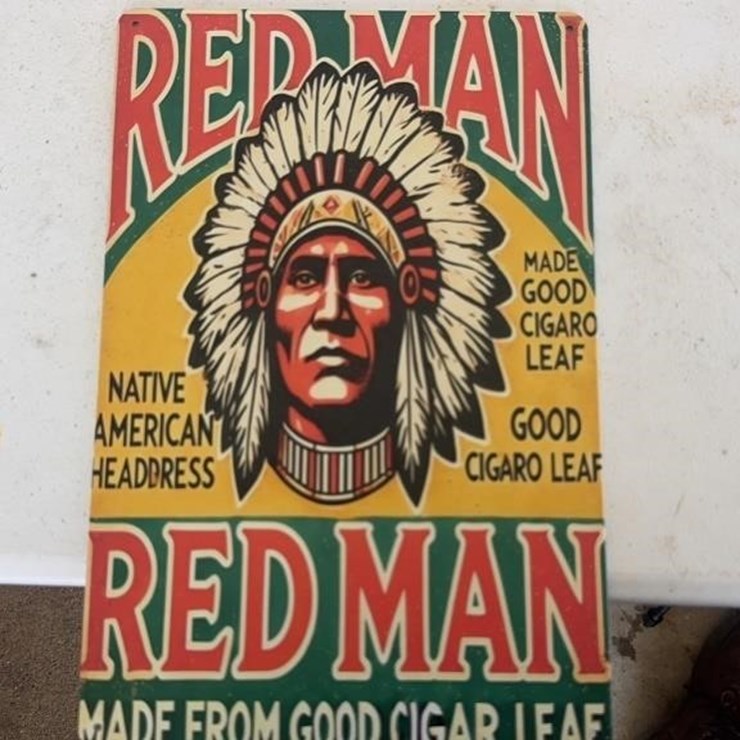 Red man tin sign