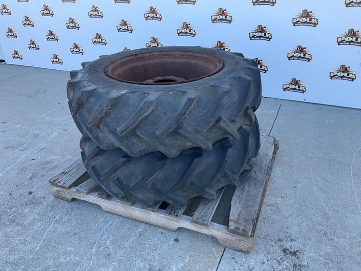 #5046-•-(2)-firestone-12.4-24-agricultural-tractor-tires-on-steel-rims-image-1