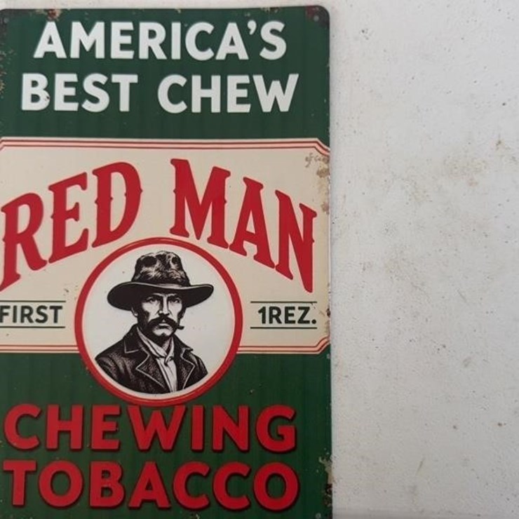 Red man tin sign