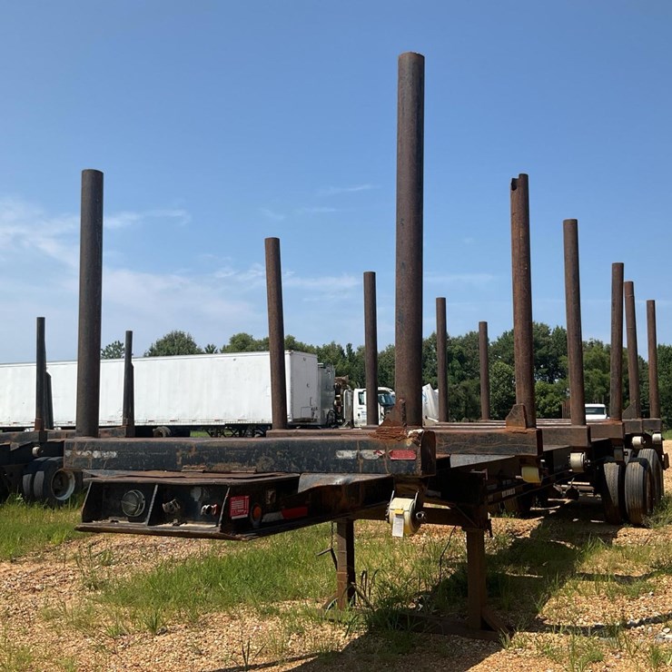 #615 • 1995 Savannah Log Trailer
